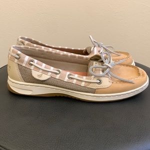 Tan Sperry shoes.